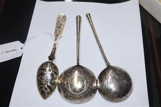 A Russian 84 zlotnik silver gilt and niello spoon, assay master probably Andrei Koralsky, 1842, L 17.5cm and four other Russian spoons